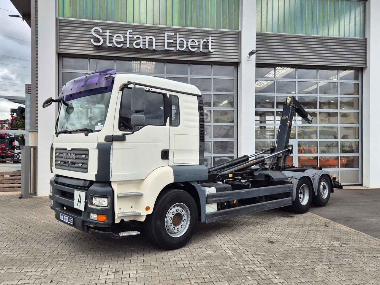 MAN TGA 26.440 6x2-2 BL Meiller RK 20.70 Bett - Kancalı yükleyici kamyon: fotoğraf 1 MAN TGA 26.440 6x2-2 BL Meiller RK 20.70 Bett - Kancalı yükleyici kamyon: fotoğraf 1