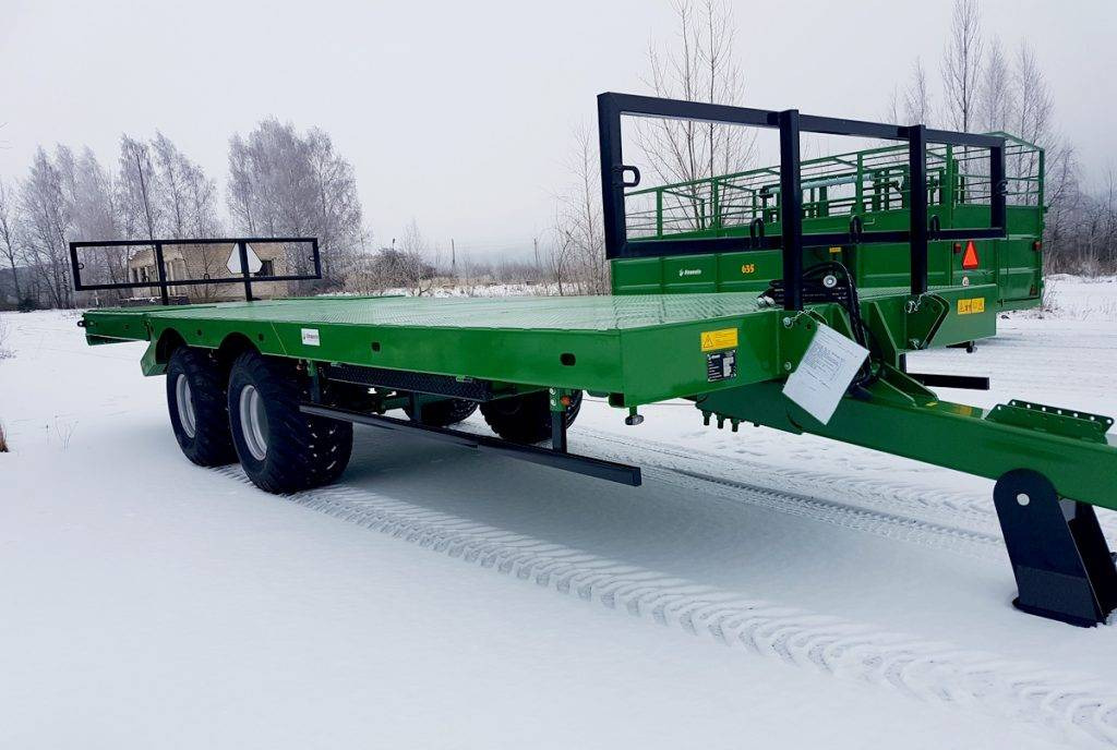 Dinapolis hydraulic bale trailer 14t, RPT-8000 - Platform traktör römorku: fotoğraf 1 Dinapolis hydraulic bale trailer 14t, RPT-8000 - Platform traktör römorku: fotoğraf 1
