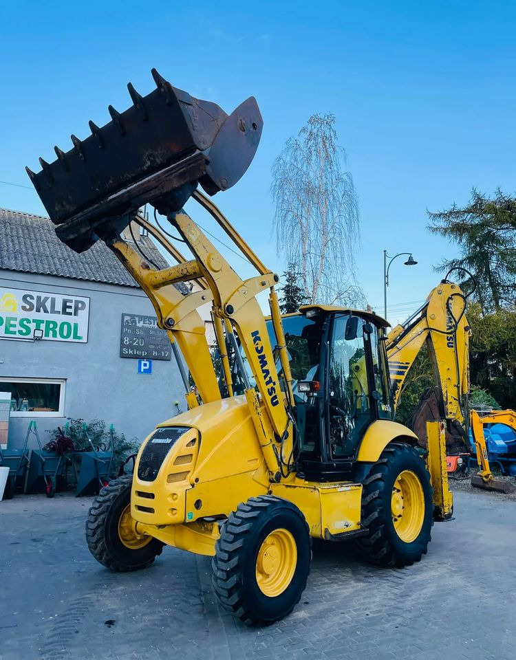 Komatsu WB93R - Iş makinesi: fotoğraf 1 Komatsu WB93R - Iş makinesi: fotoğraf 1