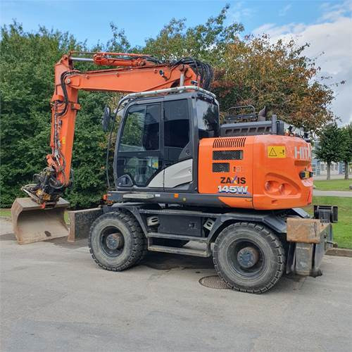 Hitachi ZX145 WT-6 - Tekerlekli ekskavatör: fotoğraf 1 Hitachi ZX145 WT-6 - Tekerlekli ekskavatör: fotoğraf 1