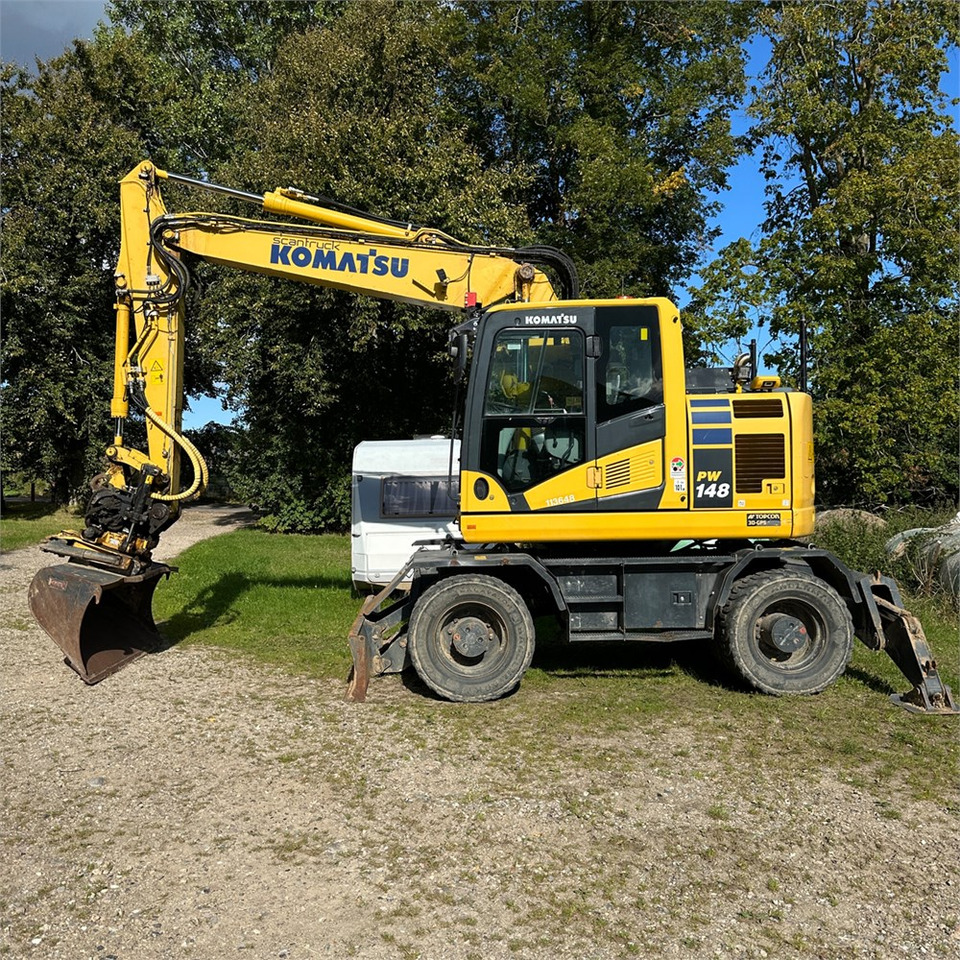 Komatsu PW148-11 - Tekerlekli ekskavatör: fotoğraf 1 Komatsu PW148-11 - Tekerlekli ekskavatör: fotoğraf 1
