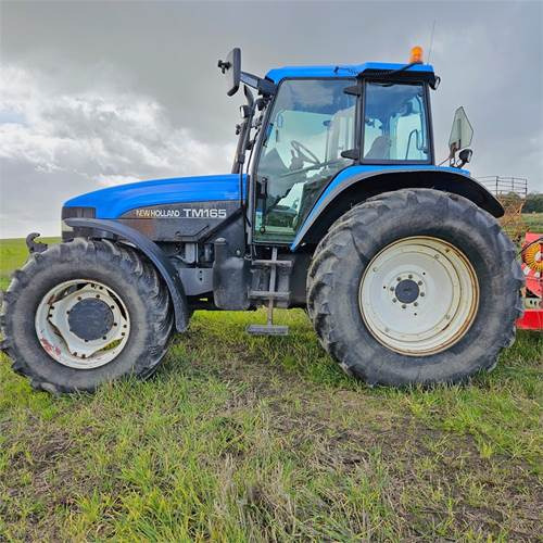 New Holland TM165 - Traktör: fotoğraf 1 New Holland TM165 - Traktör: fotoğraf 1
