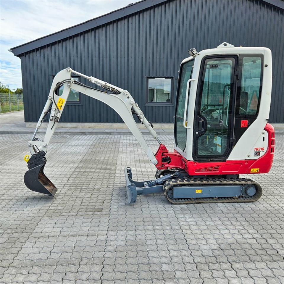 Takeuchi TB216 - Mini ekskavatör: fotoğraf 1 Takeuchi TB216 - Mini ekskavatör: fotoğraf 1