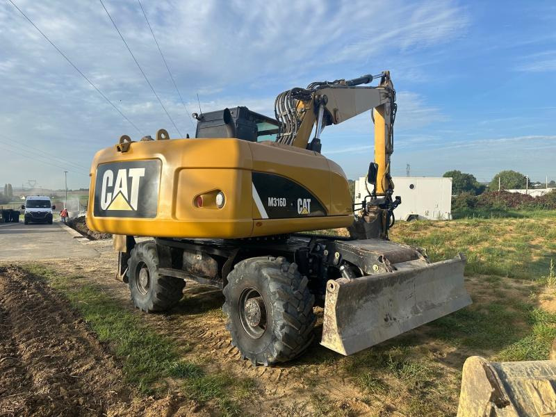 Caterpillar M 316D - Tekerlekli ekskavatör: fotoğraf 2 Caterpillar M 316D - Tekerlekli ekskavatör: fotoğraf 2