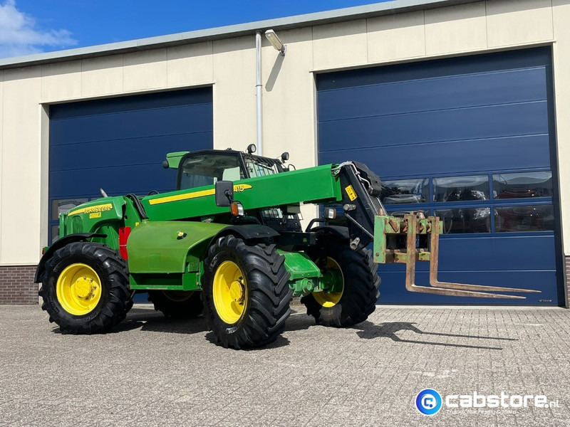 John Deere 3415 Verreiker met vorken en laadschop - Tarım araçları: fotoğraf 1 John Deere 3415 Verreiker met vorken en laadschop - Tarım araçları: fotoğraf 1