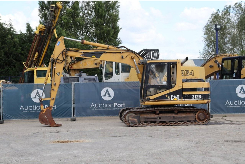 Caterpillar 312BL - Paletli ekskavatör: fotoğraf 1 Caterpillar 312BL - Paletli ekskavatör: fotoğraf 1