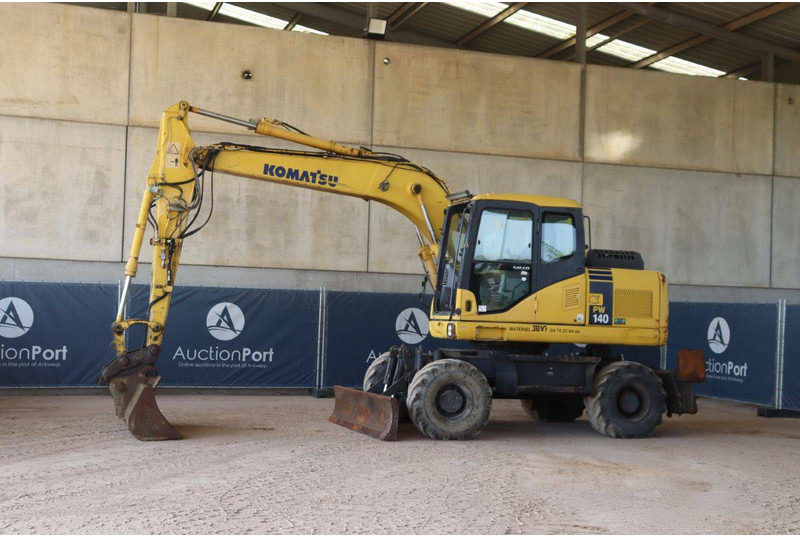 Komatsu PW140-7 - Tekerlekli ekskavatör: fotoğraf 1 Komatsu PW140-7 - Tekerlekli ekskavatör: fotoğraf 1