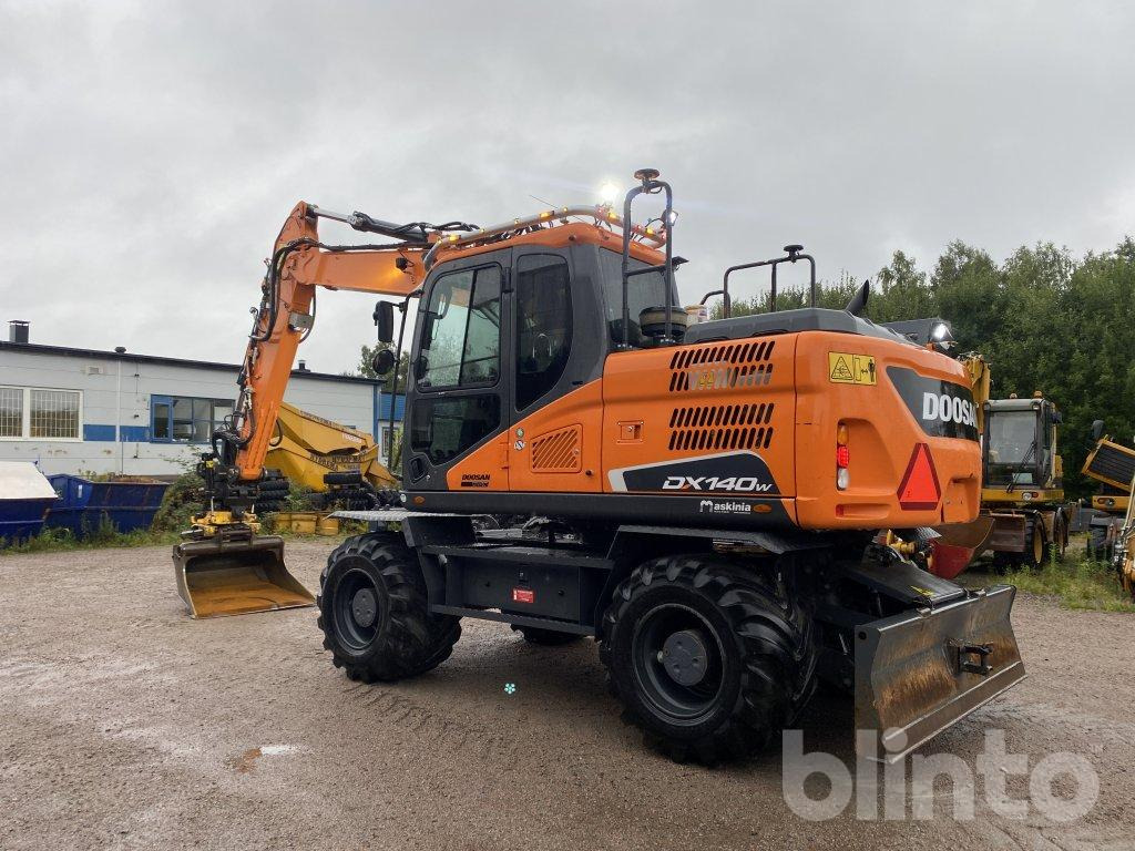 Doosan DX 140W - Tekerlekli ekskavatör: fotoğraf 4 Doosan DX 140W - Tekerlekli ekskavatör: fotoğraf 4