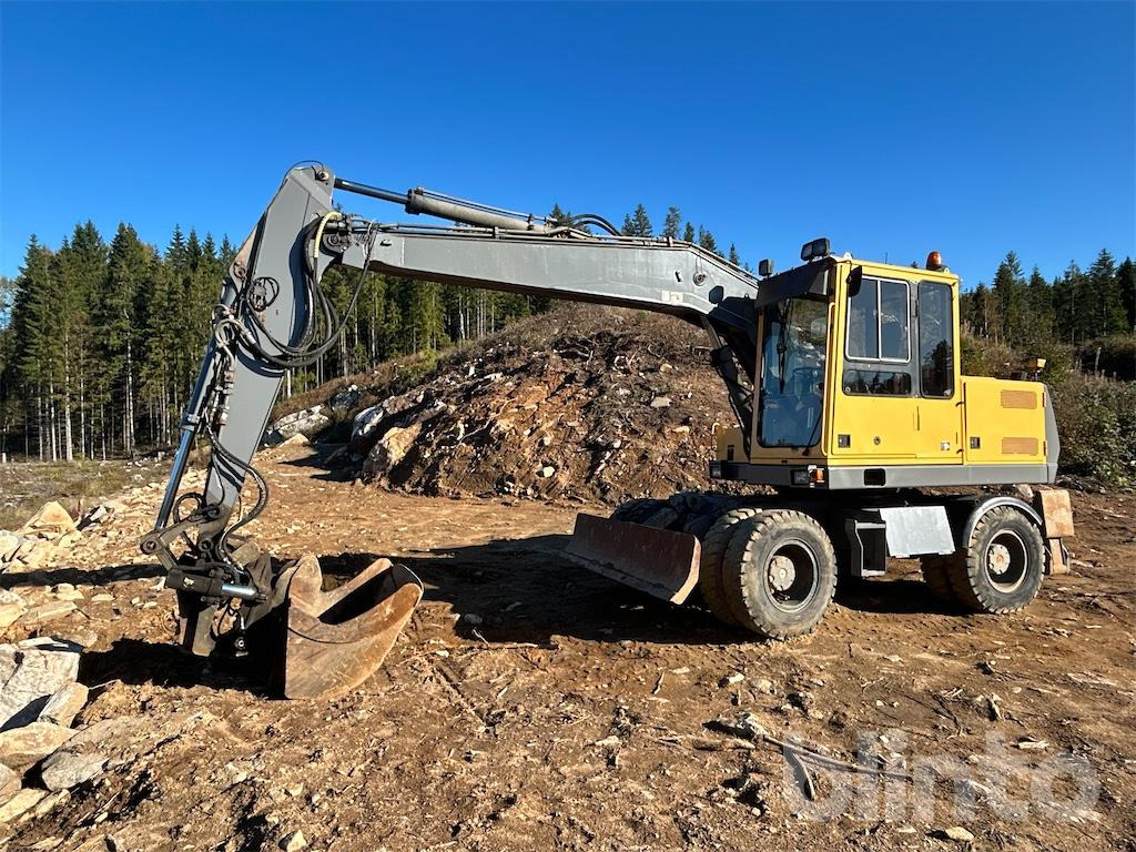 Volvo EW150C - Tekerlekli ekskavatör: fotoğraf 1 Volvo EW150C - Tekerlekli ekskavatör: fotoğraf 1