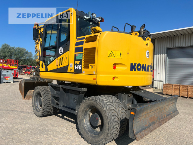 Komatsu PW148-11 - Tekerlekli ekskavatör: fotoğraf 2 Komatsu PW148-11 - Tekerlekli ekskavatör: fotoğraf 2
