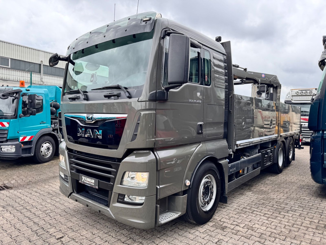 MAN 26.460 TGX Baustoffkran HMF 2110-L3 - Vinçli kamyon: fotoğraf 2 MAN 26.460 TGX Baustoffkran HMF 2110-L3 - Vinçli kamyon: fotoğraf 2